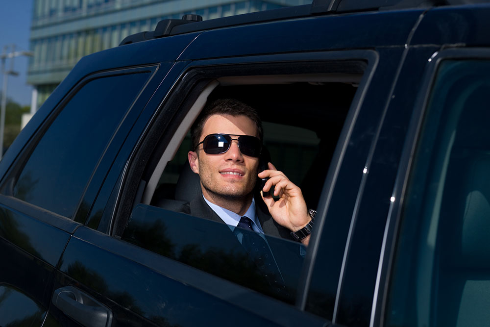 la confidential SUV and business man
