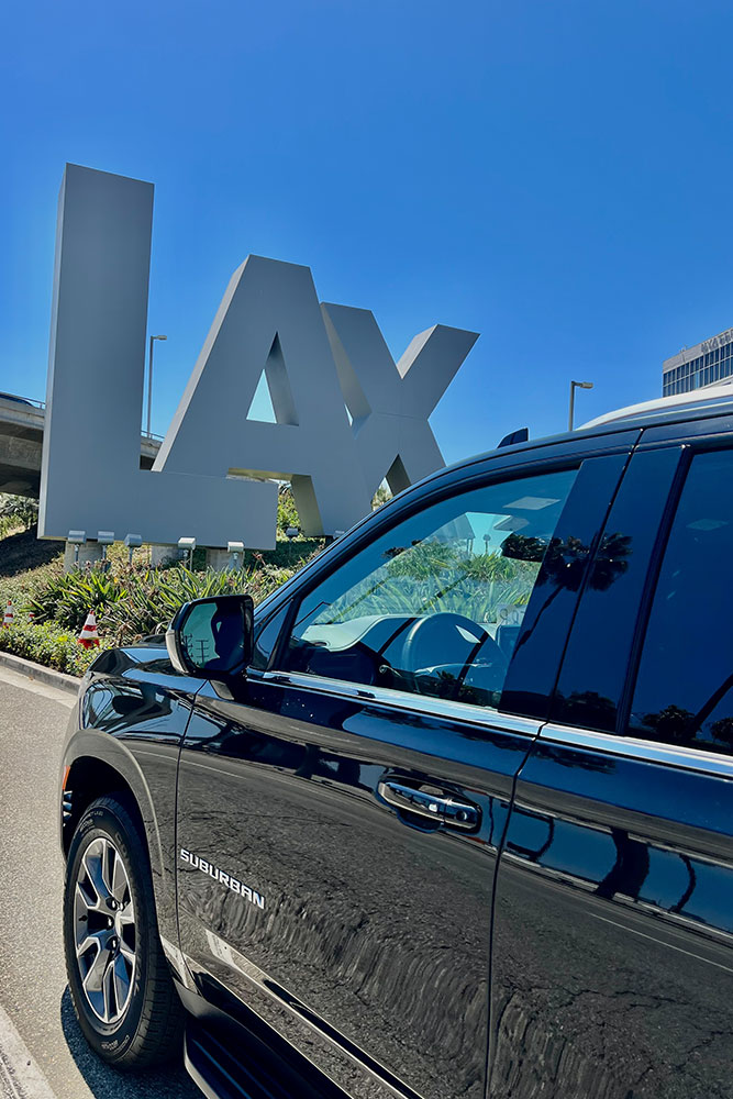 chevrolet suburban at LAX Airpot sign by LA Confidential Car Service