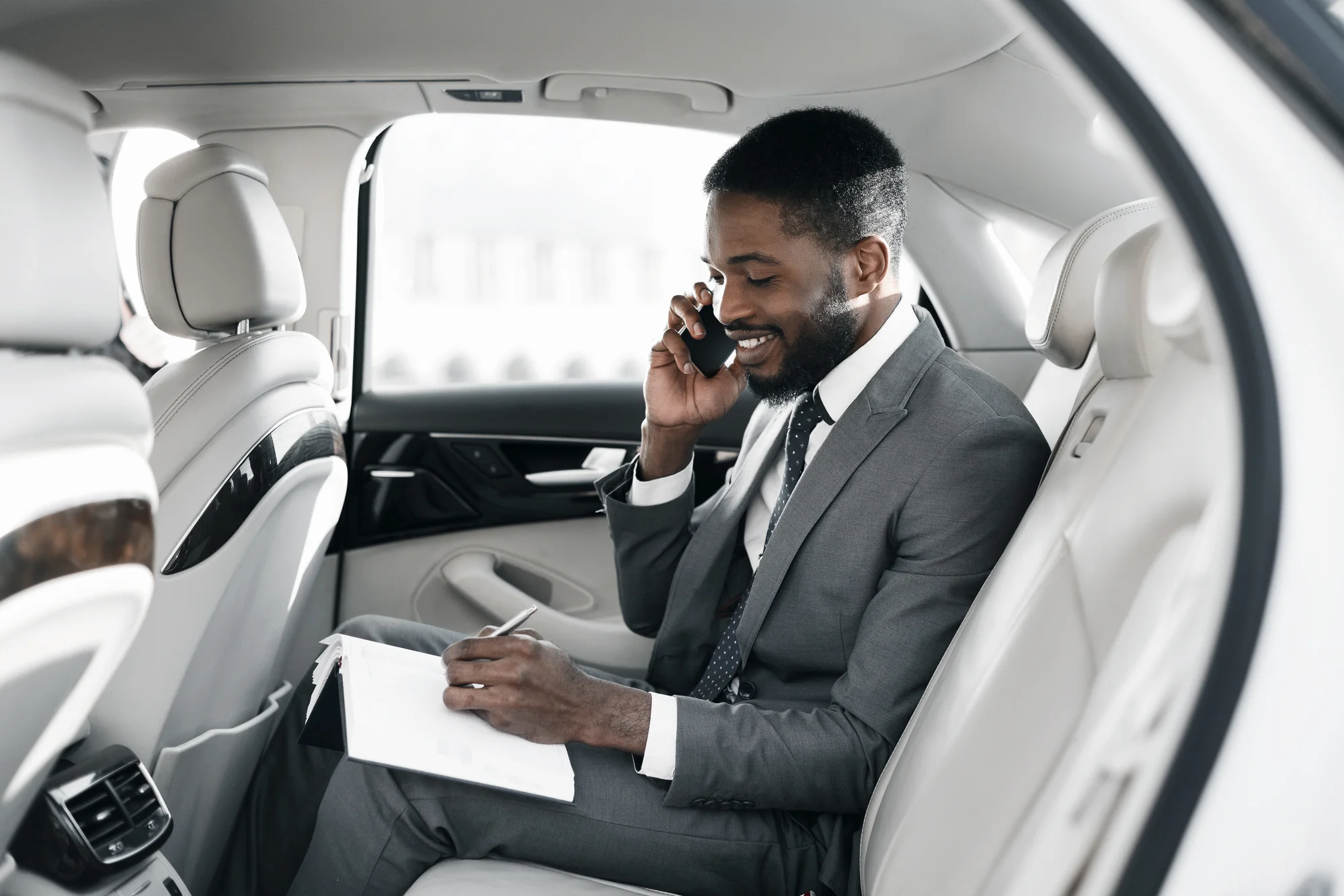 business man in la confidential lprivate car